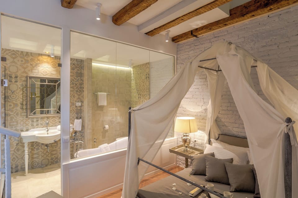 Deluxe Double Room, Air conditioning, City View | Minibar, in-room safe, desk, laptop workspace