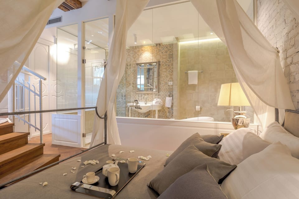 Deluxe Double Room, Air conditioning, City View | Minibar, in-room safe, desk, laptop workspace