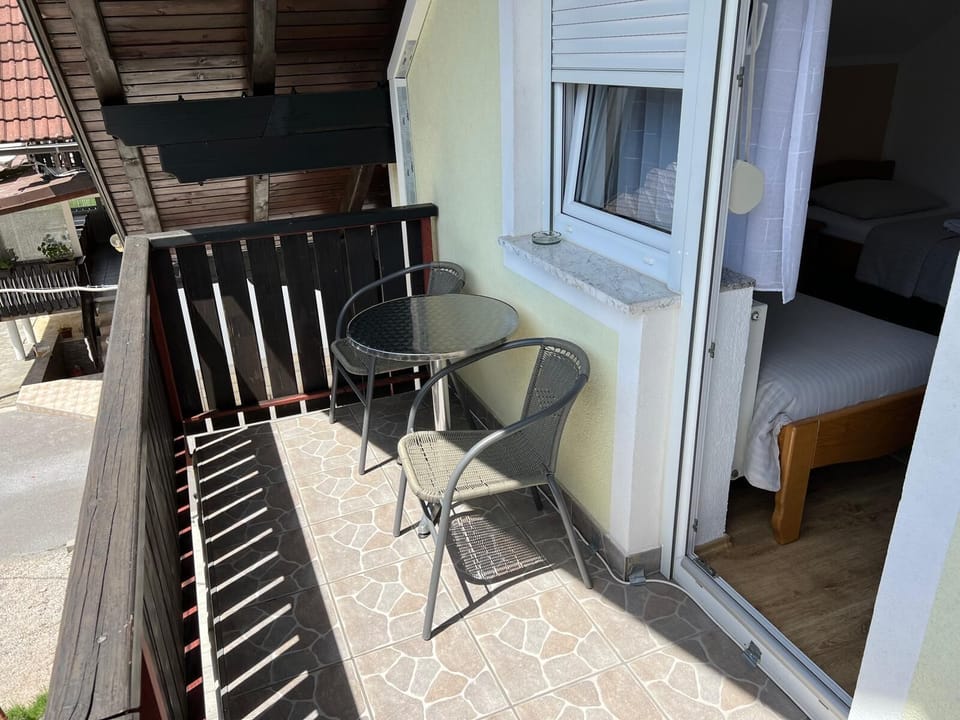 Twin Room, Balcony, Courtyard View | Outdoor dining