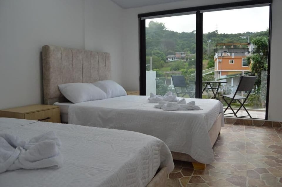 Deluxe Triple Room, Balcony, Garden View