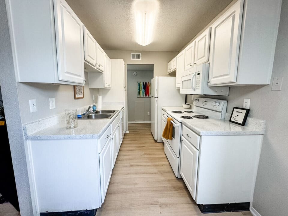 Clean and modern kitchen fully stocked for your stay
