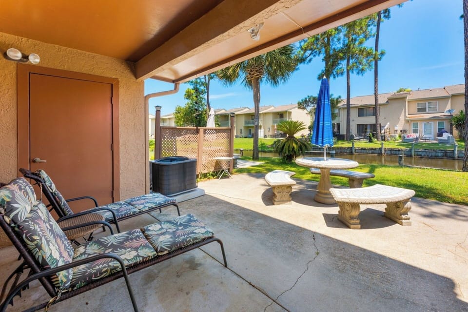 Great covered and uncovered patio with table seating and loungers