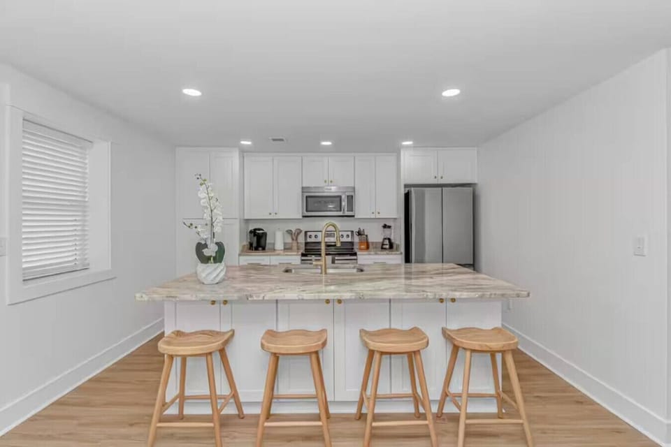 Large Kitchen with Island Seating Ideal for Family Meals