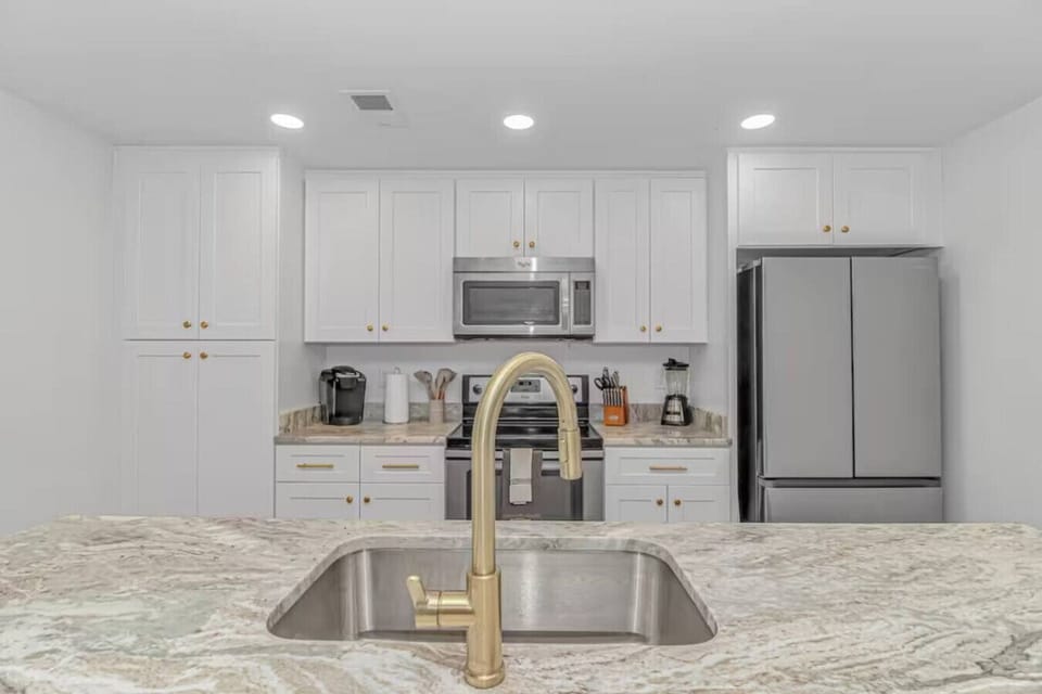 Spacious Kitchen with Island Perfect for Cooking and Gathering