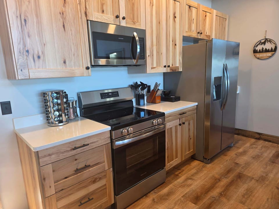 The first full kitchen is located on the upper level.