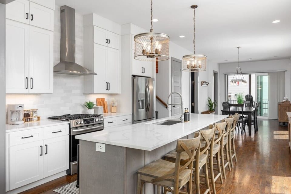 Fully-stocked, modern kitchen suitable for any chef! We provide all the essential supplies and utensils you`ll need for your morning coffee routine and any other cooking adventures. Kitchen island has seating for 5.