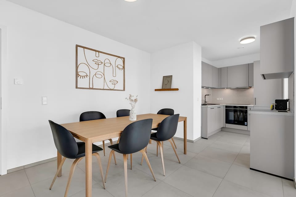 Open kitchen and dining layout with modern design and practical setup.