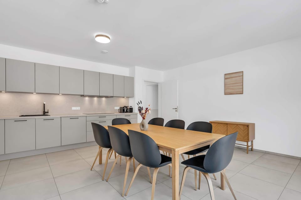 Open kitchen and dining layout with spacious and functional design.