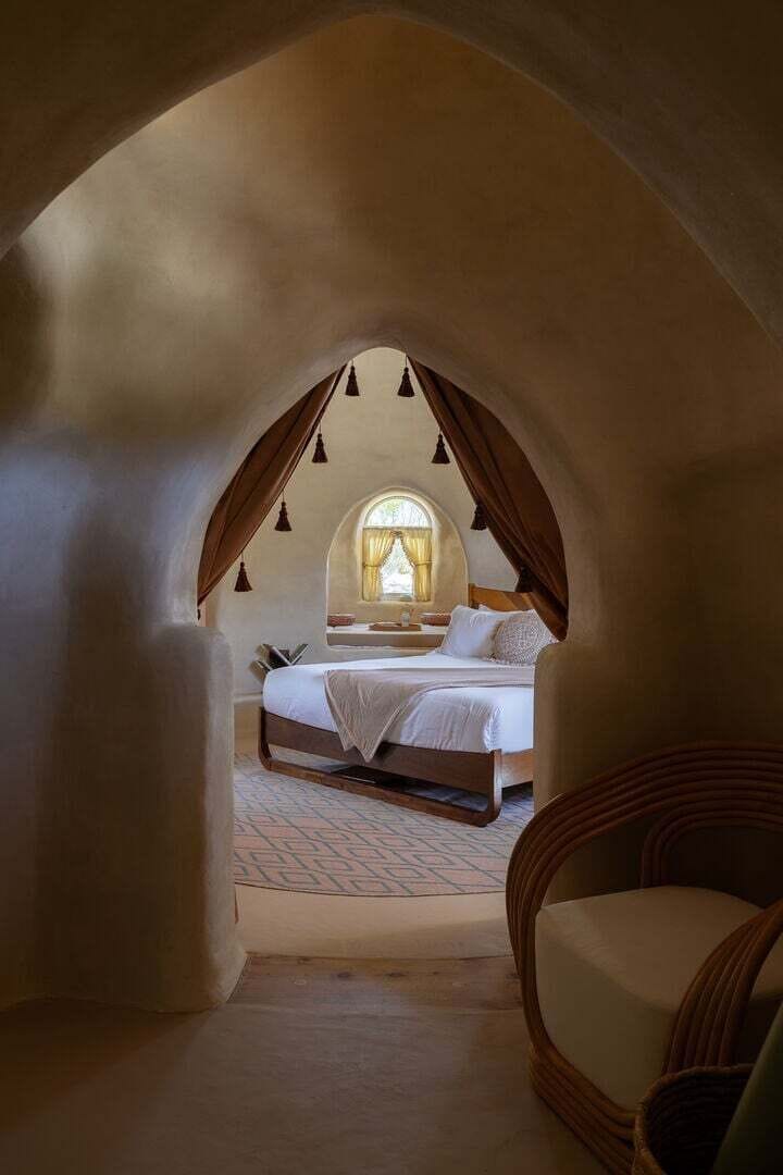 Primary suite with king bed and ensuite bathroom.