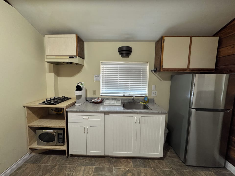 Family Studio, Balcony, Mountain View | Private kitchen | Coffee/tea maker, paper towels