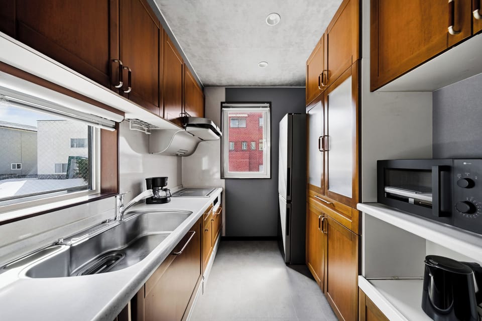 Apartment | Private kitchen | Fridge, microwave, stovetop, rice cooker