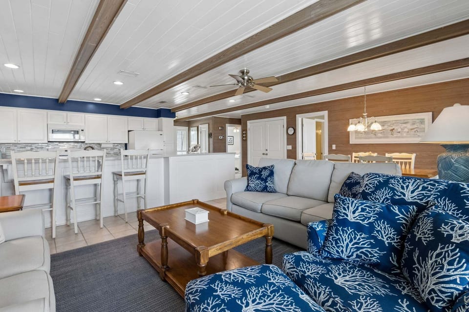 Sunny Living Area with Oceanfront Views and Flat Screen Smart TV