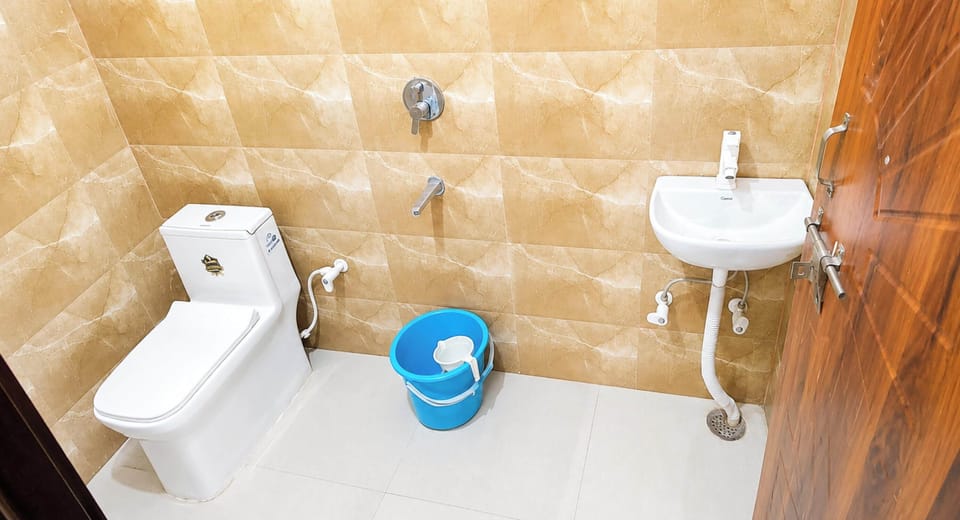 Standard Double Room, Air conditioning | Bathroom | Shower, rainfall showerhead, slippers, towels