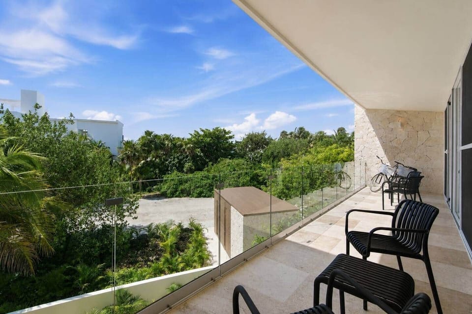 Relax on the spacious 34-foot private balcony featuring outdoor furniture, beautiful greenery views, and refreshing ocean breezes. Guests also have access to 2 bikes to enjoy during their stay.
