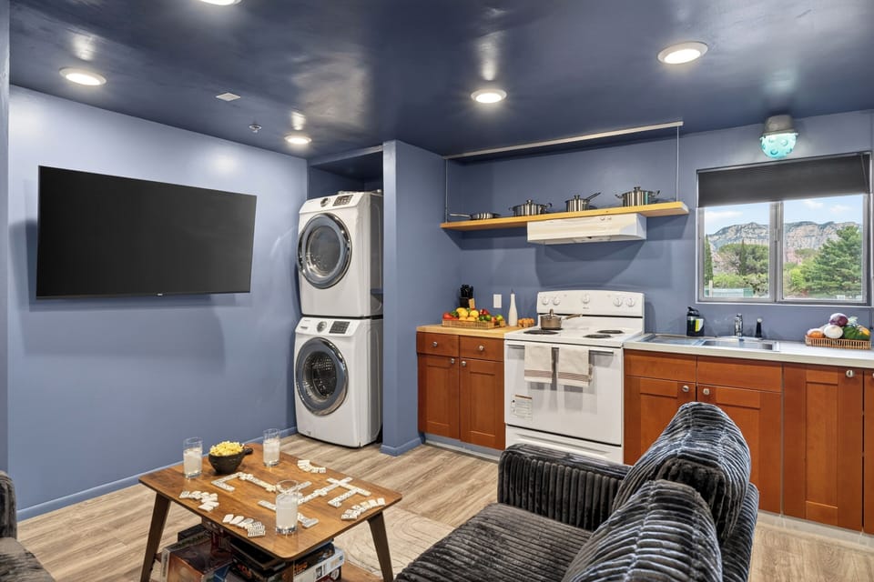 This cozy retreat features a kitchen, in-unit washer and dryer, oversized sleeper sectional, and mountain views right from the window.