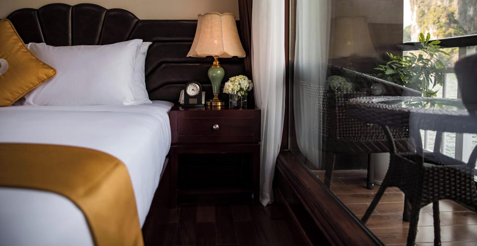 Junior Triple Suite Sea View with Private Balcony | Minibar, in-room safe, blackout drapes, iron/ironing board (on request)