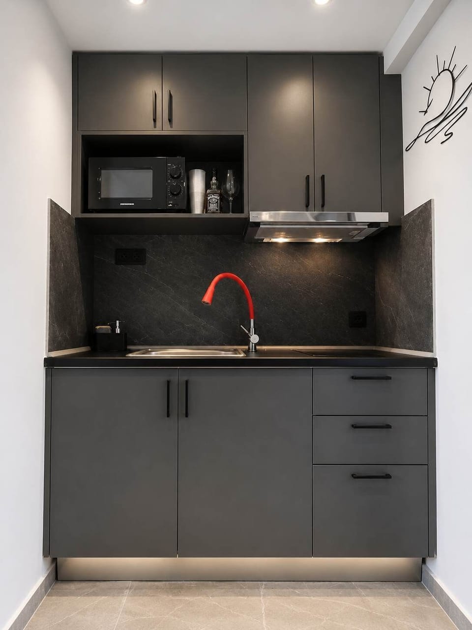 Fully equipped kitchenette with everything needed for preparing simple meals and snacks.