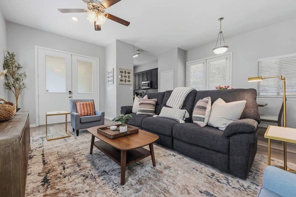 Relax in a stylish open-concept living area perfect for debriefing after a Rangers game, catching highlights on the smart TV, or simply unwinding with your group after a day in Arlington.