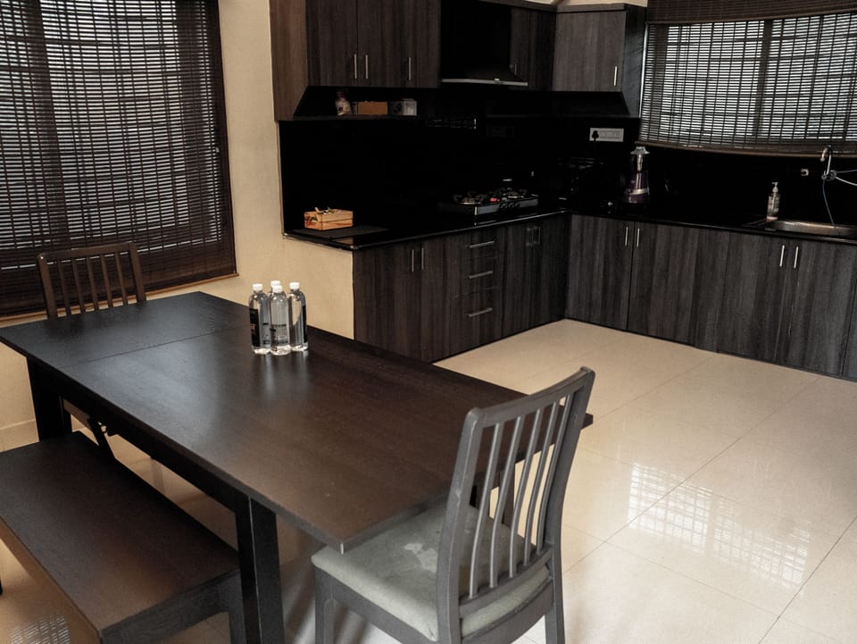 Villa, 3 Bedrooms, Balcony | Private kitchen | Electric kettle, dining tables