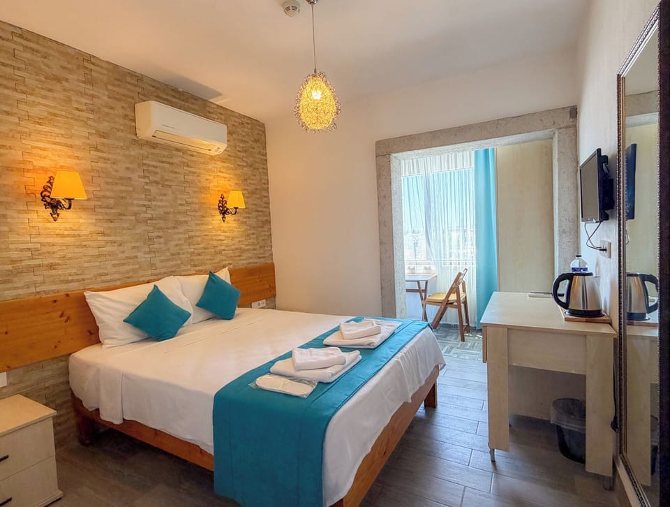 Economy Double Room, Pool View | Desk, WiFi (free), bed sheets