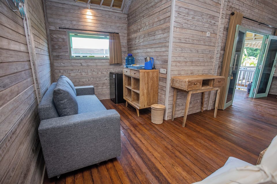 Superior Quadruple Room, Balcony, Garden View | Living area