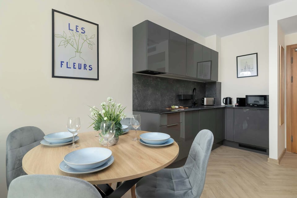 Cook and dine in style with the modern kitchenette and dining area.