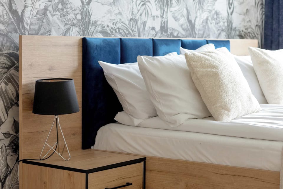 Enjoy the simplicity and comfort of the bedroom's modern design. 