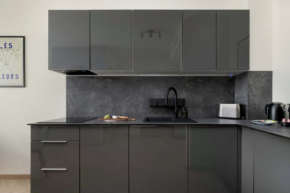 The fully equipped kitchenette includes everything you need for a home-cooked meal.