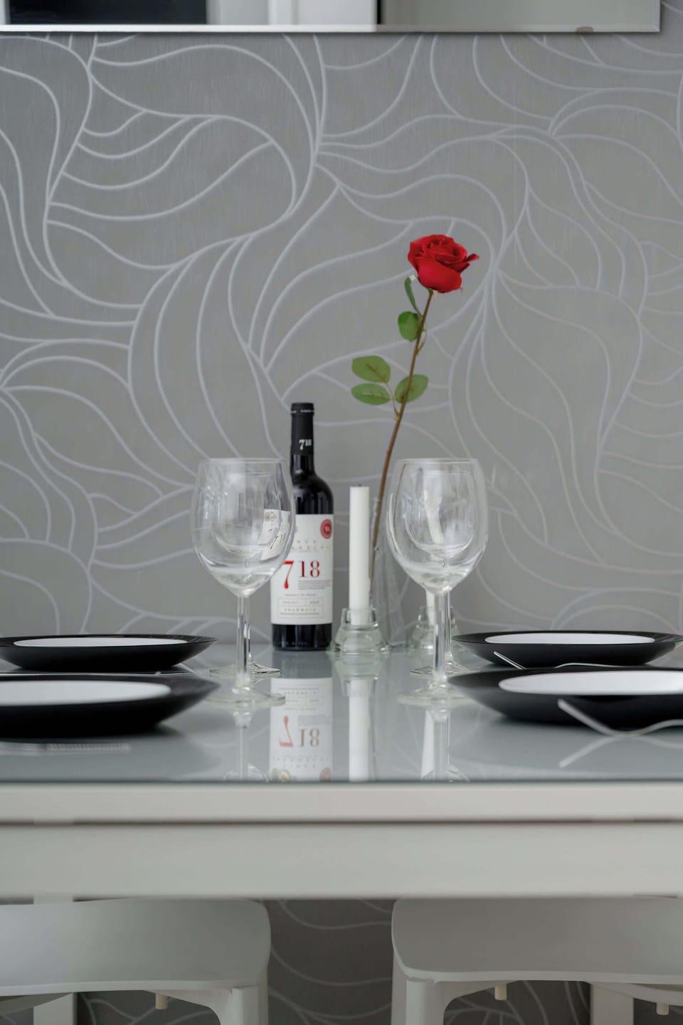 Elegant dining table setup with stylish decorative details and modern interior touches.