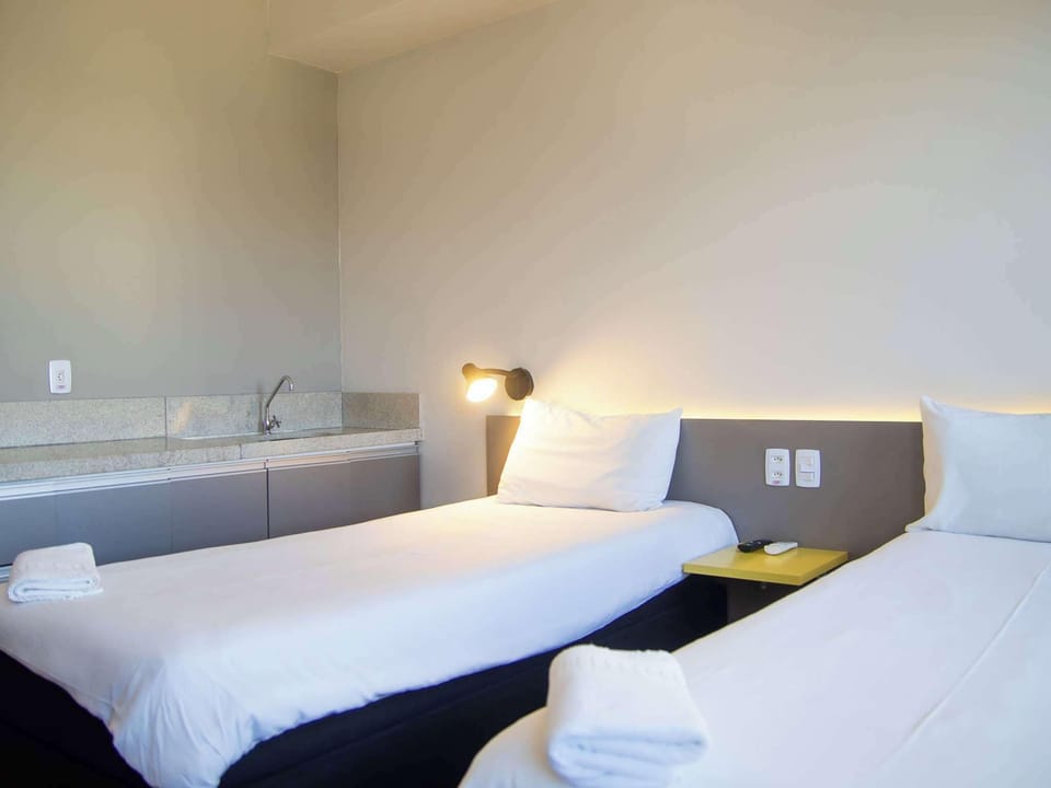 Standard Twin Room | Laptop workspace, blackout drapes, soundproofing, iron/ironing board