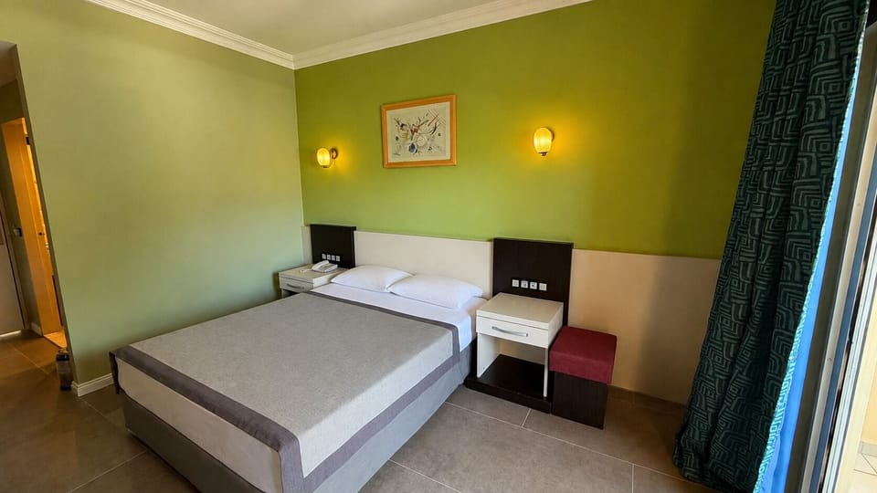 Standard Double Room, Balcony, Pool View | Egyptian cotton sheets, premium bedding, minibar, desk