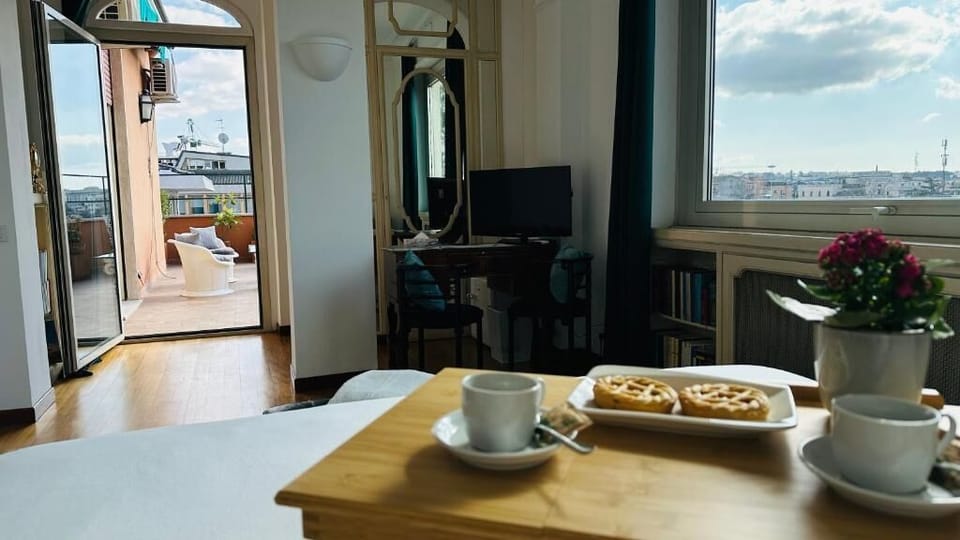 Junior Suite, Balcony, City View | Minibar, in-room safe, iron/ironing board, WiFi (free)