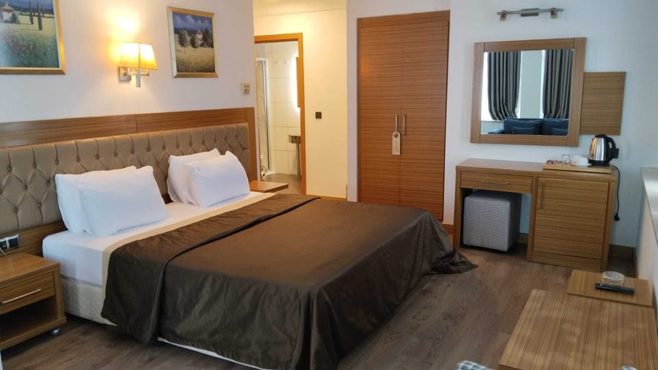In-room safe, desk, laptop workspace, blackout drapes