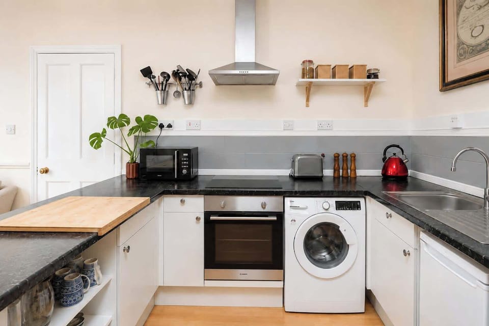 The kitchen is fully equipped to prepare a simple meal 