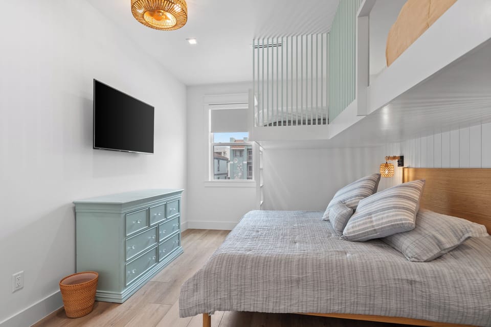Beautifully designed with modern touches throughout including built-in wall charger outlets and individual reading lights, plus a flat-screen TV
