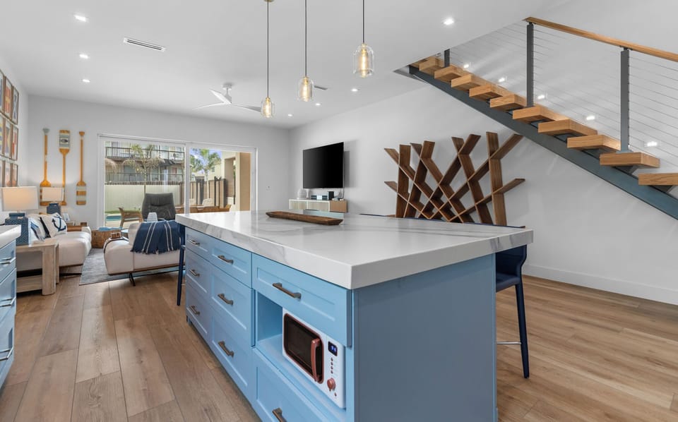 Seamless flow from the gourmet kitchen to the lounge and outdoor entertaining space
