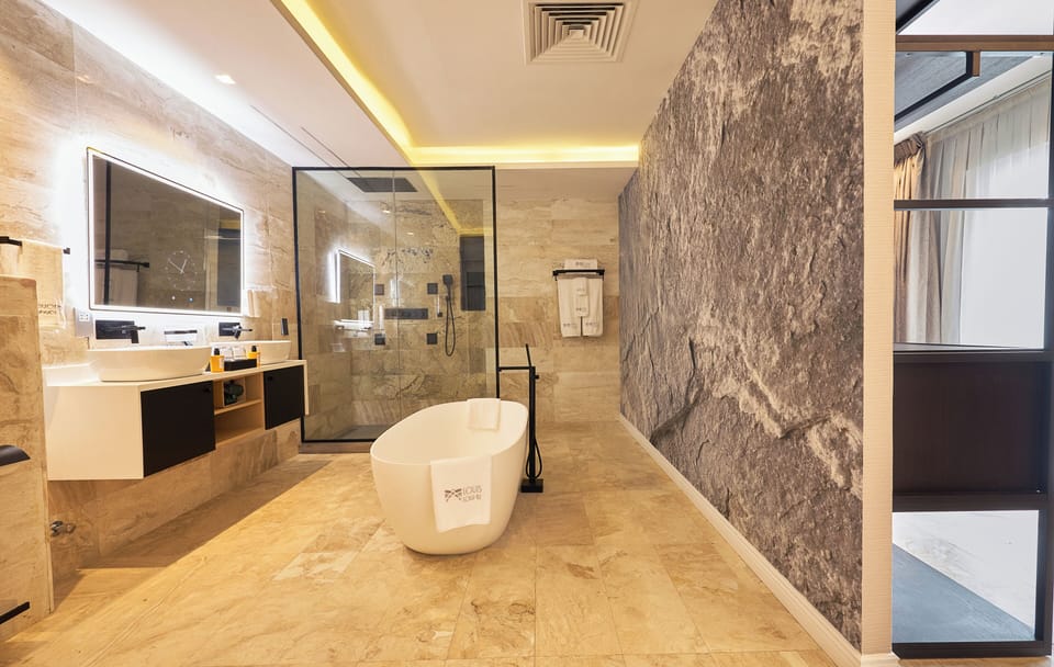 Presidential Double Room, Balcony, Pool View | Bathroom | Shower, slippers, towels, soap