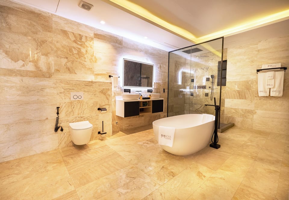 Presidential Double Room, Balcony, Pool View | Bathroom | Shower, slippers, towels, soap