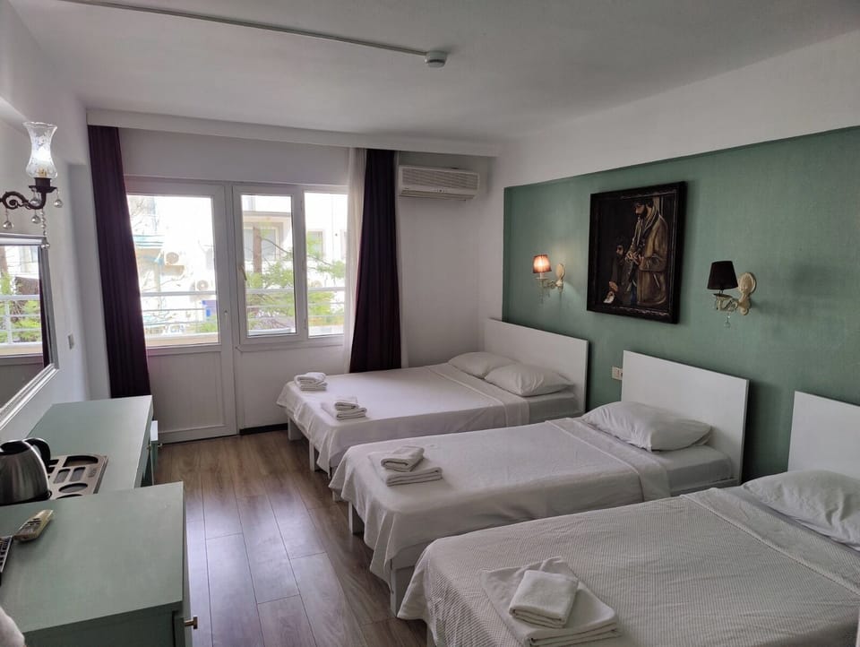 Classic Quadruple Room, Balcony, City View | Free WiFi