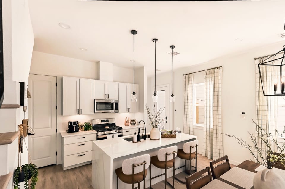 Large kitchen island with breakfast bar seating-perfect for gathering!