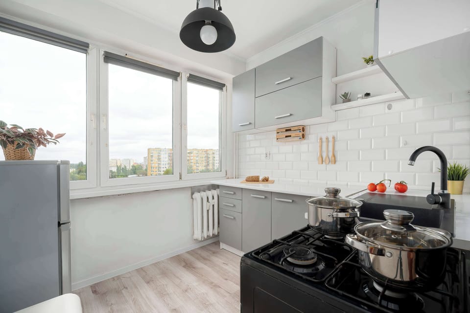 Modern kitchen with panoramic window and cooking area