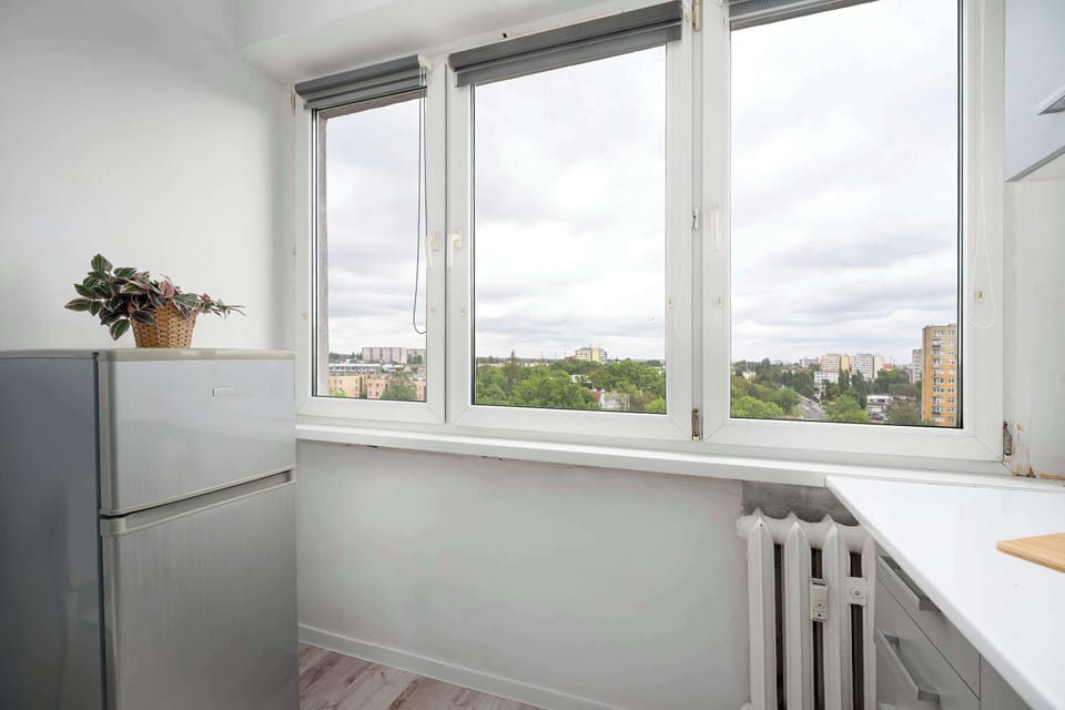 Bright kitchen corner with city view and natural light