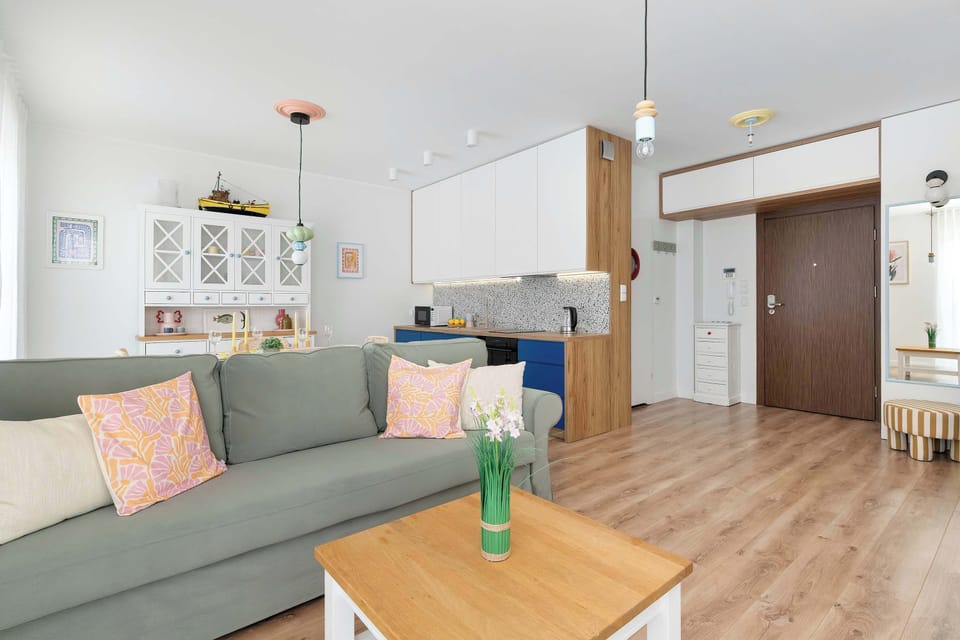 Spacious living room with sofa and wooden coffee table