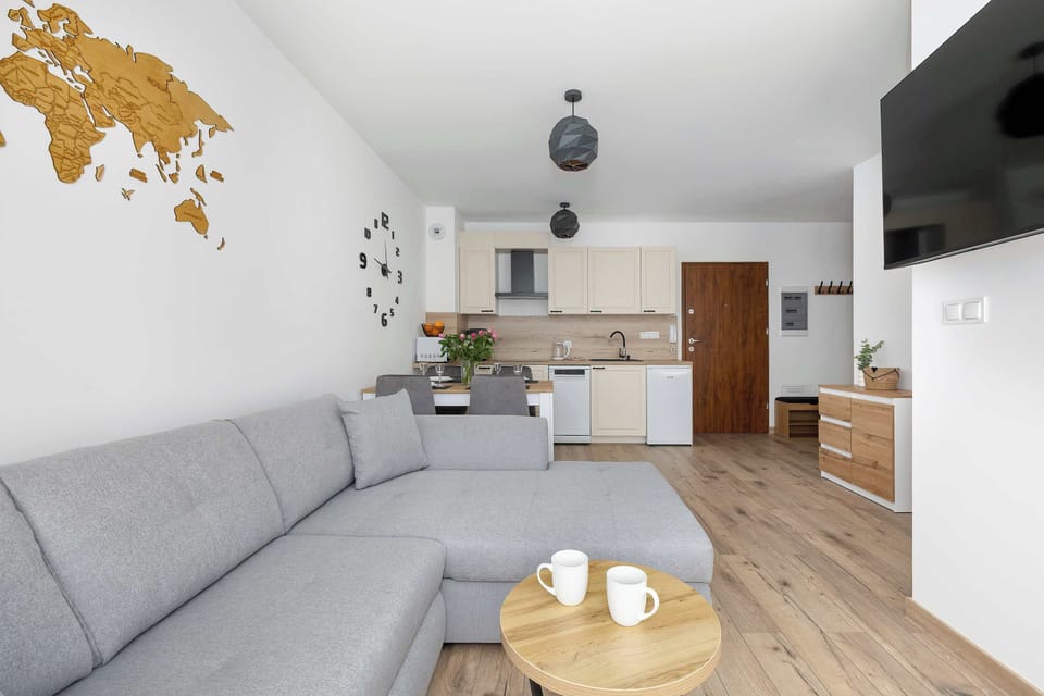 Open-plan living room with dining area and kitchen