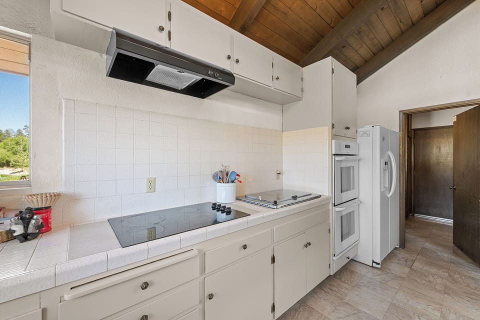 Full Kitchen - Full Kitchen with lake views and all of the essential amenities.
