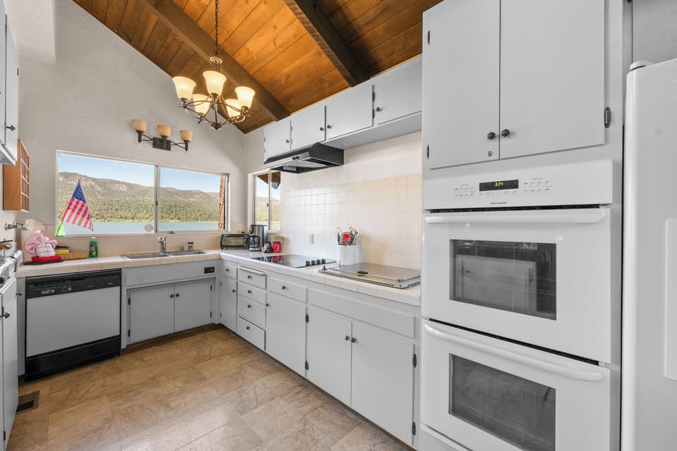 Full Kitchen - Full Kitchen with lake views and all of the essential amenities.