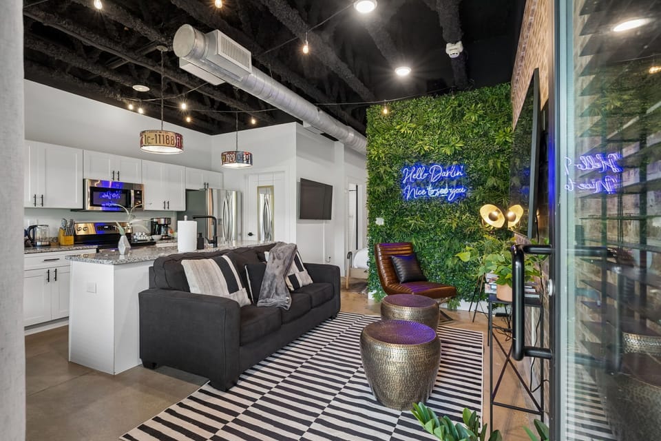 Living Room: Unwind in the cozy living room with a Samsung Smart TV (Roku-loaded) and a sofa bed that converts for two extra guests.