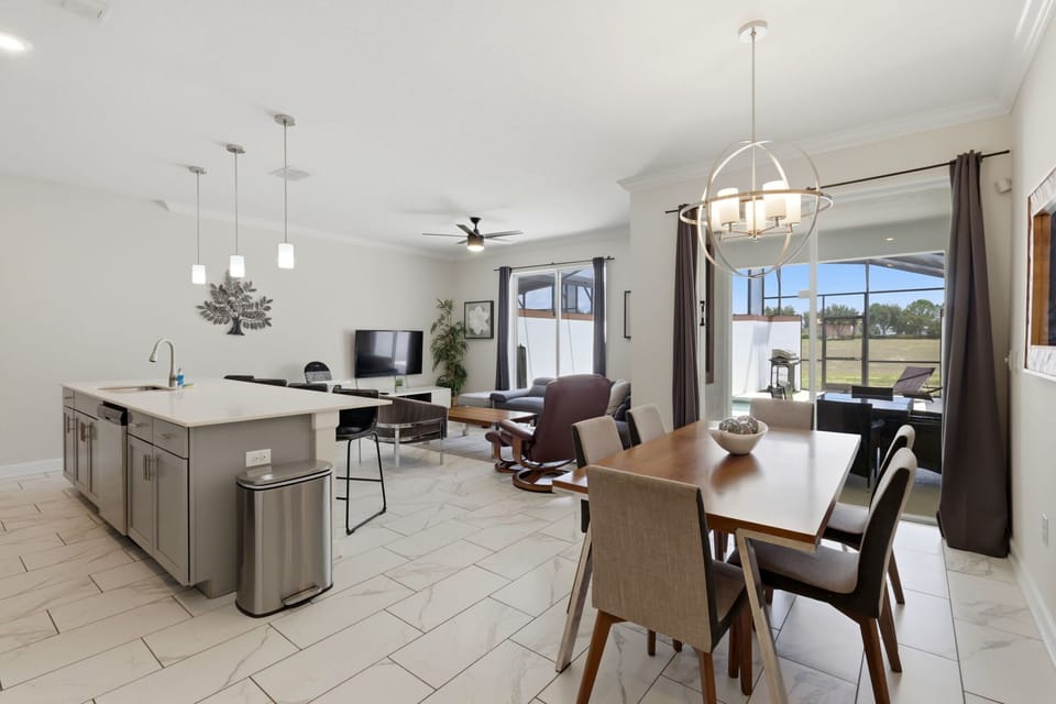 Bright open-concept living with room for the whole family to relax after a day at the parks.