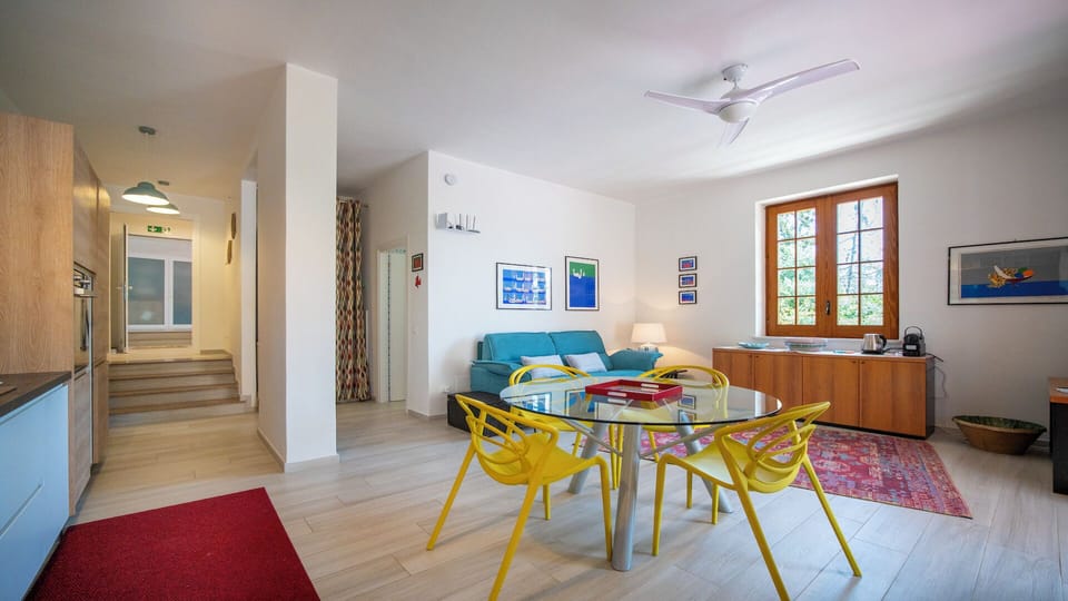 Apartment | Living area | 32-inch flat-screen TV with cable channels