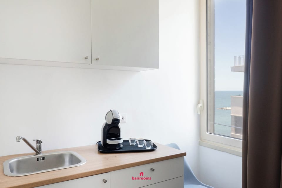 Deluxe Triple Room, Sea View | Private kitchen | Espresso maker, electric kettle